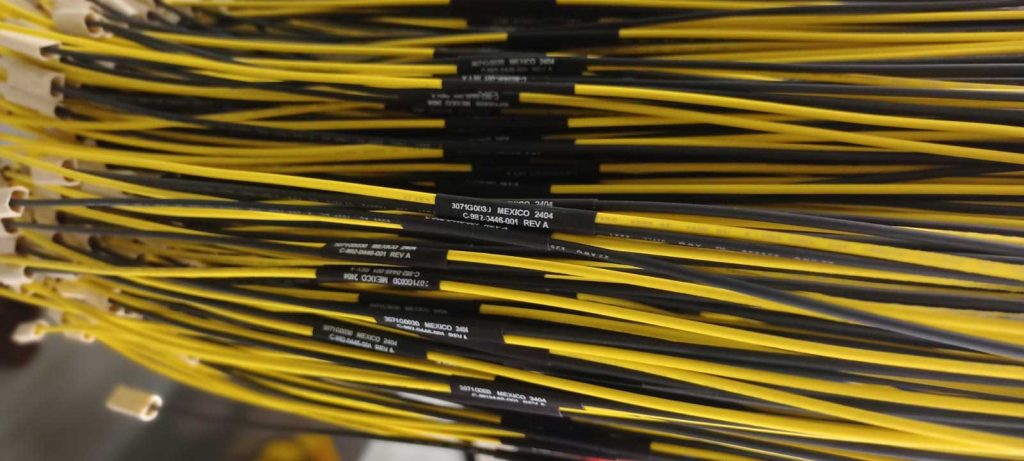 printed label on heat shrink tubing on harness